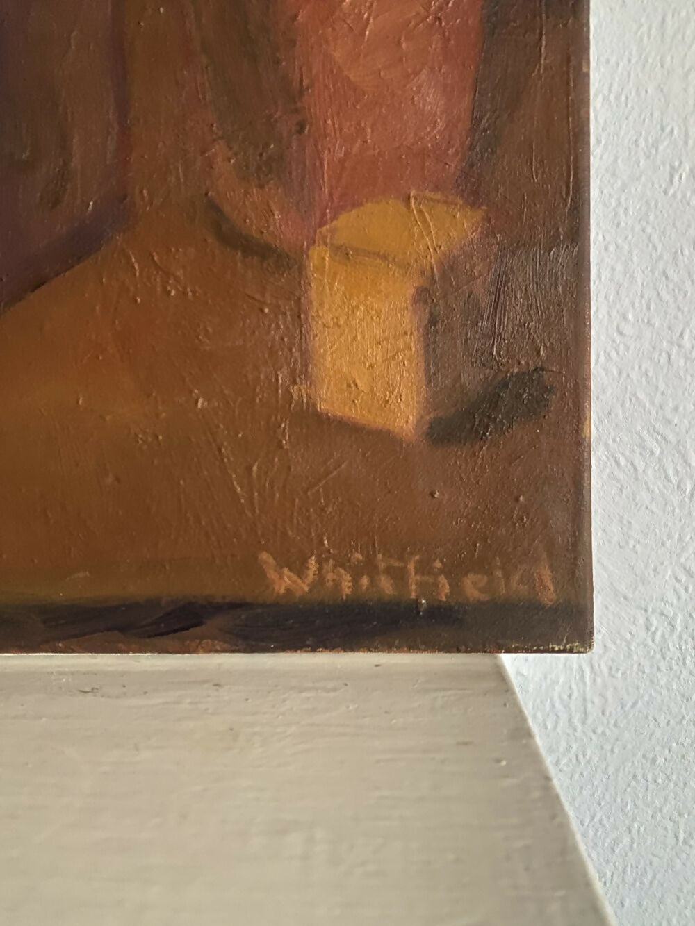 Close-up of a painting with a signature on a white wall, available  to buy on the-salon.com. SALON curates the finest , unique, handmade pieces from the interior industry's best makers and brands. Shop luxury furniture, lighting, rugs, art, antiques and vintage pieces and accessories from SALON interior designed rooms.