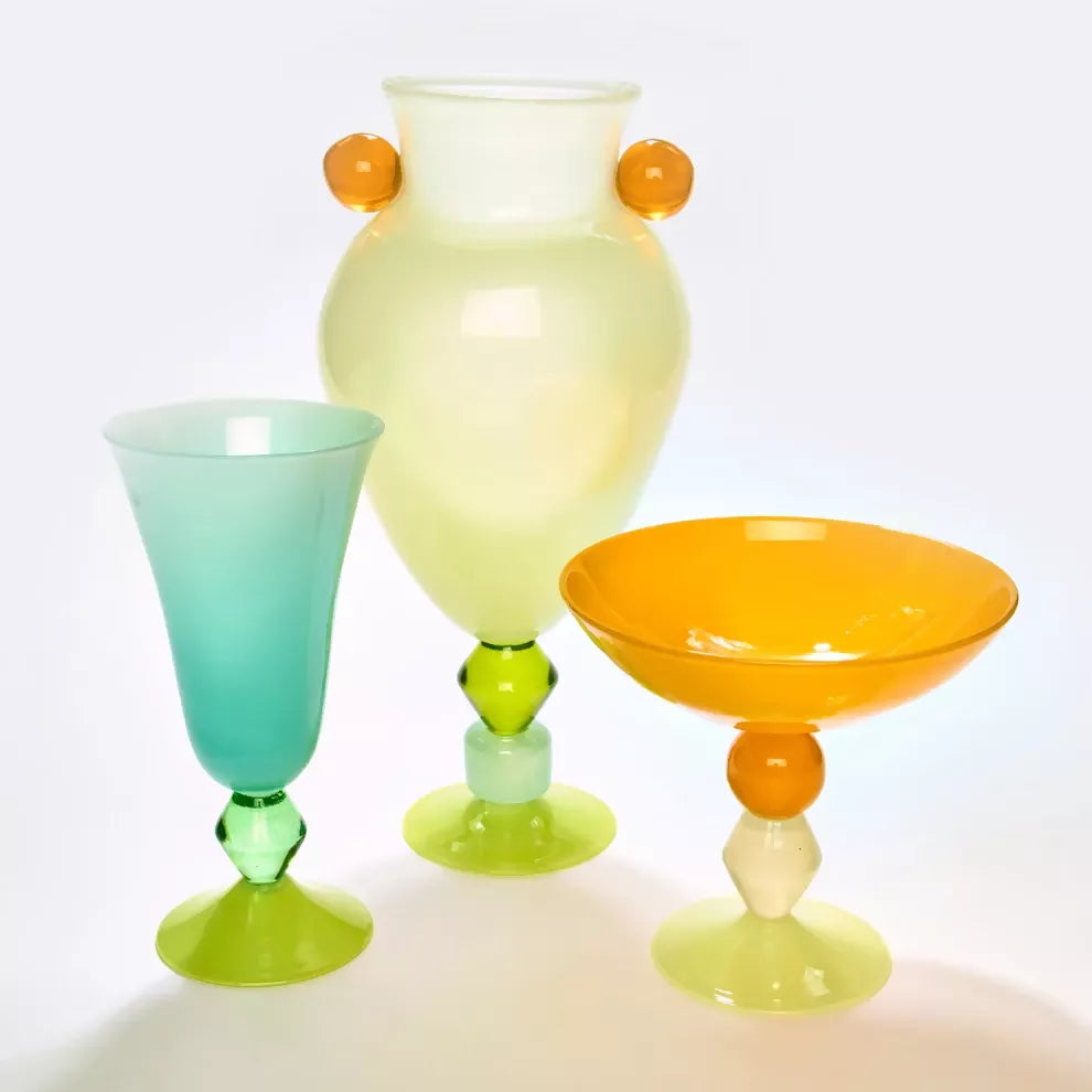 Three colorful glass pieces on a white background,  available  to buy on the-salon.com. SALON curates the finest , unique, handmade pieces from the interior industry's best makers and brands. Shop luxury furniture, lighting, rugs, art, antiques and vintage pieces and accessories from SALON interior designed rooms.
