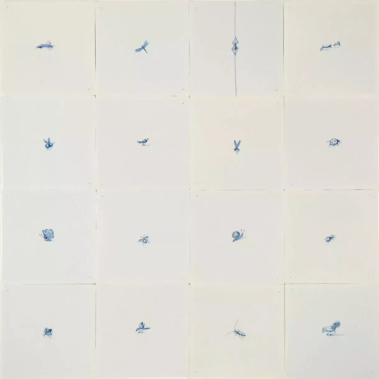 White tiles with small blue decorative elements on a white background,  available  to buy on the-salon.com. SALON curates the finest , unique, handmade pieces from the interior industry's best makers and brands. Shop luxury furniture, lighting, rugs, art, antiques and vintage pieces and accessories from SALON interior designed rooms.