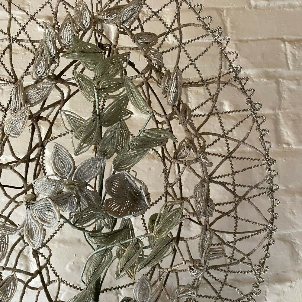 Decorative wall art with leaf patterns on a textured wall,  available  to buy on the-salon.com. SALON curates the finest , unique, handmade pieces from the interior industry's best makers and brands. Shop luxury furniture, lighting, rugs, art, antiques and vintage pieces and accessories from SALON interior designed rooms.