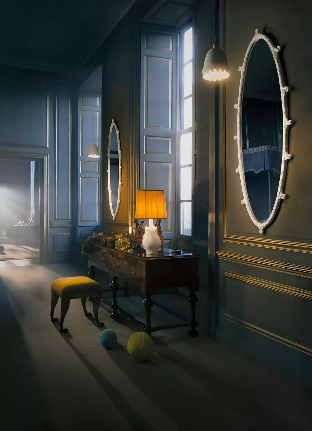 Darkly decorated room with a desk, lamp, and decorative items, featuring the white wisteria mirror, available  to buy on the-salon.com. SALON curates the finest , unique, handmade pieces from the interior industry's best makers and brands. Shop luxury furniture, lighting, rugs, art, antiques and vintage pieces and accessories from SALON interior designed rooms.