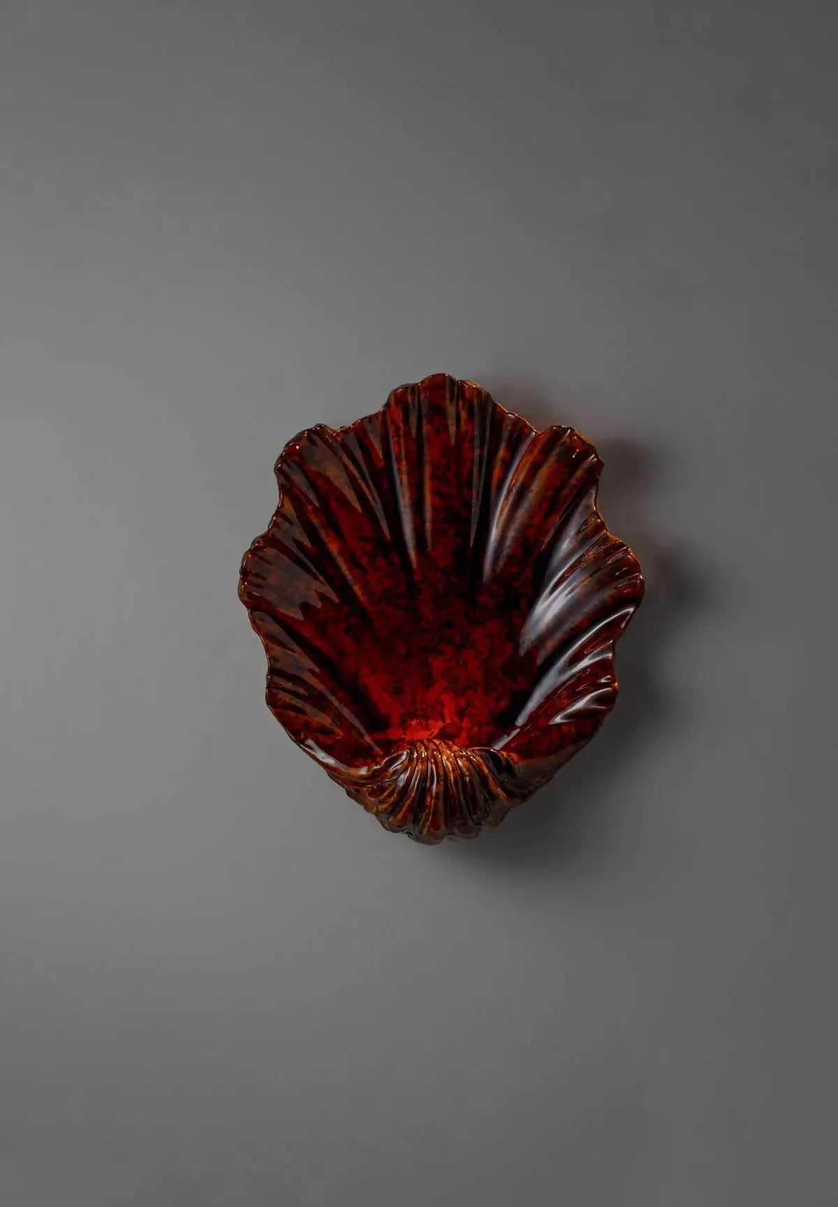 Scalloped tiger's eye Wall light, available  to buy on the-salon.com. SALON curates the finest , unique, handmade pieces from the interior industry's best makers and brands. Shop luxury furniture, lighting, rugs, art, antiques and vintage pieces and accessories from SALON interior designed rooms.