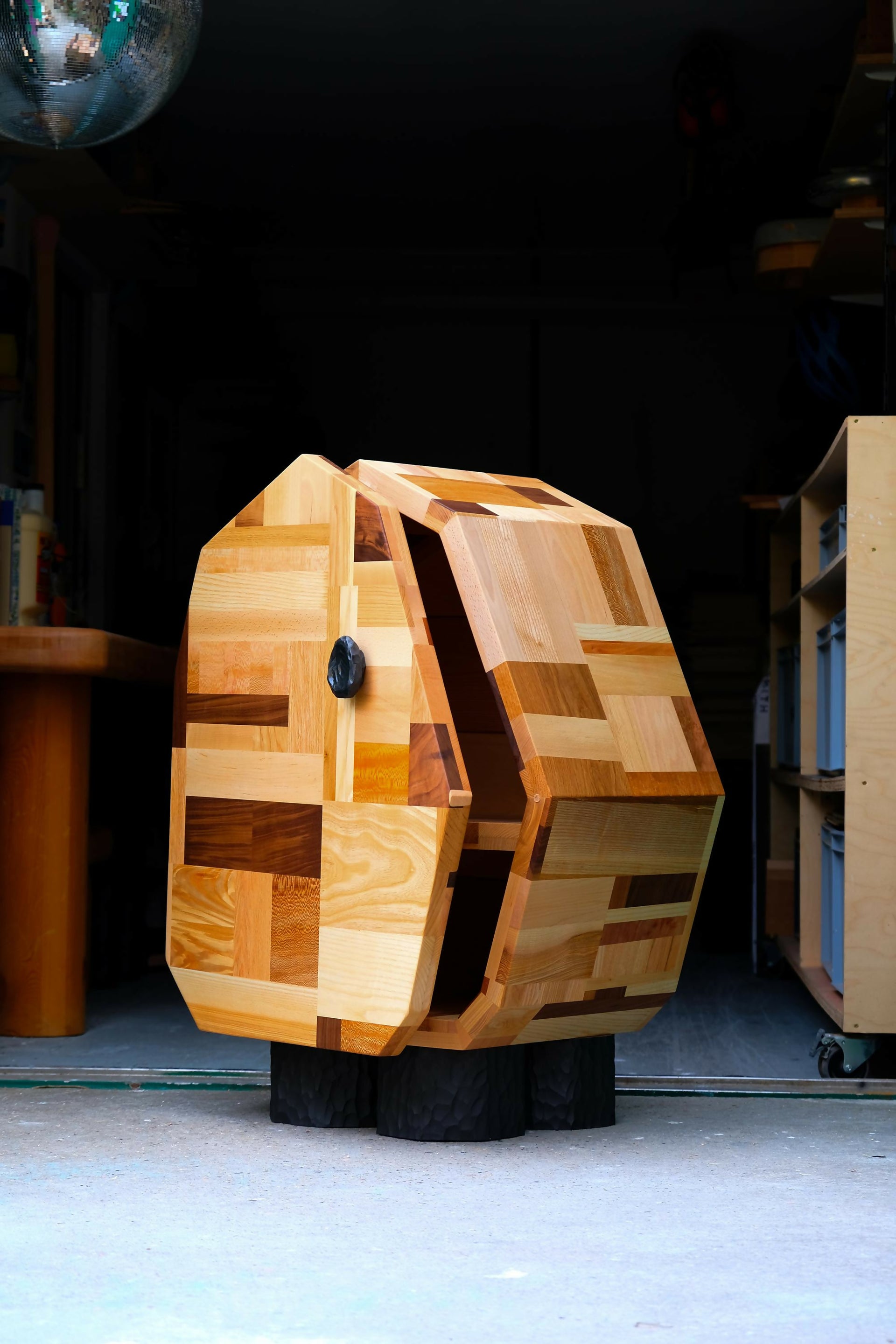 Wooden sculpture  in a workshop setting, available to buy on the-salon.com. SALON curates the finest , unique, handmade pieces from the interior industry's best makers and brands. Shop luxury furniture, lighting, rugs, art, antiques and vintage pieces and accessories from SALON interior designed rooms.