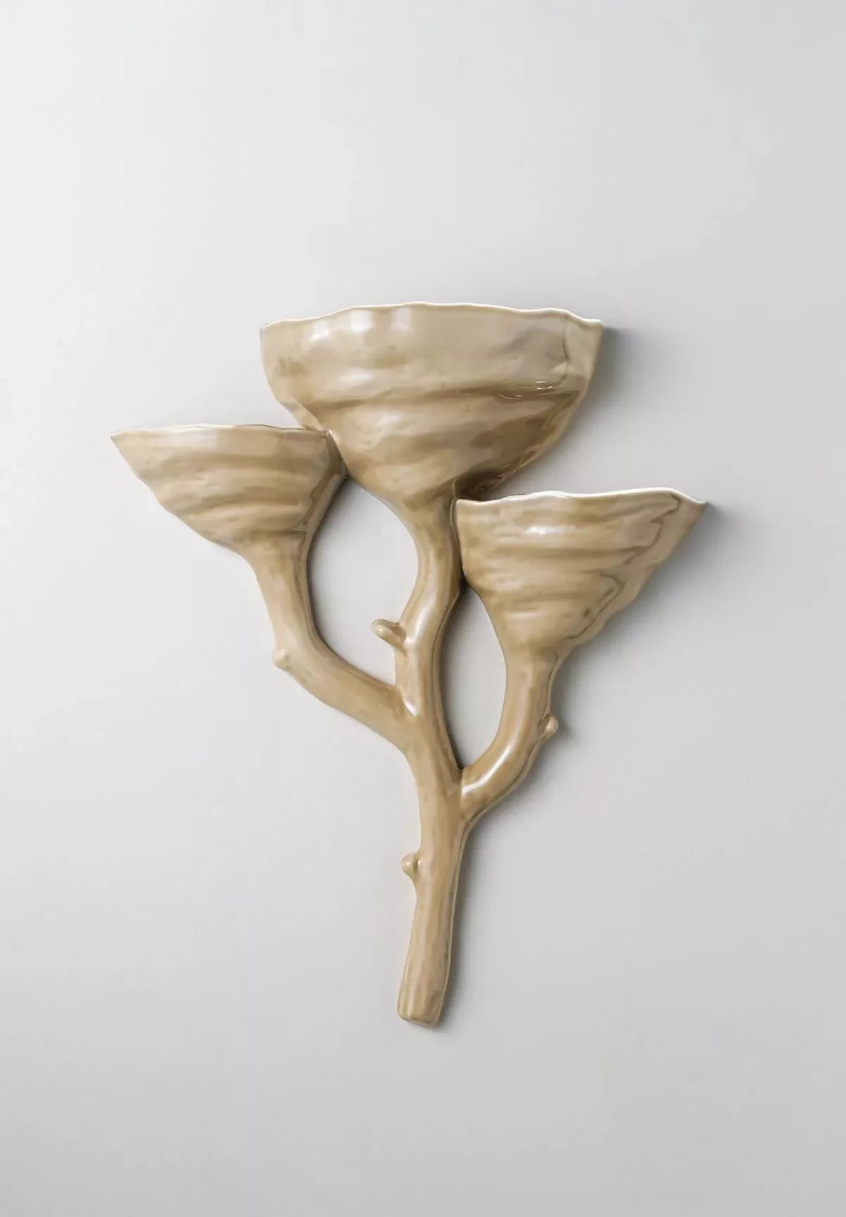 Almond ceramic wall light  available  to buy on the-salon.com. SALON curates the finest , unique, handmade pieces from the interior industry's best makers and brands. Shop luxury furniture, lighting, rugs, art, antiques and vintage pieces and accessories from SALON interior designed rooms.