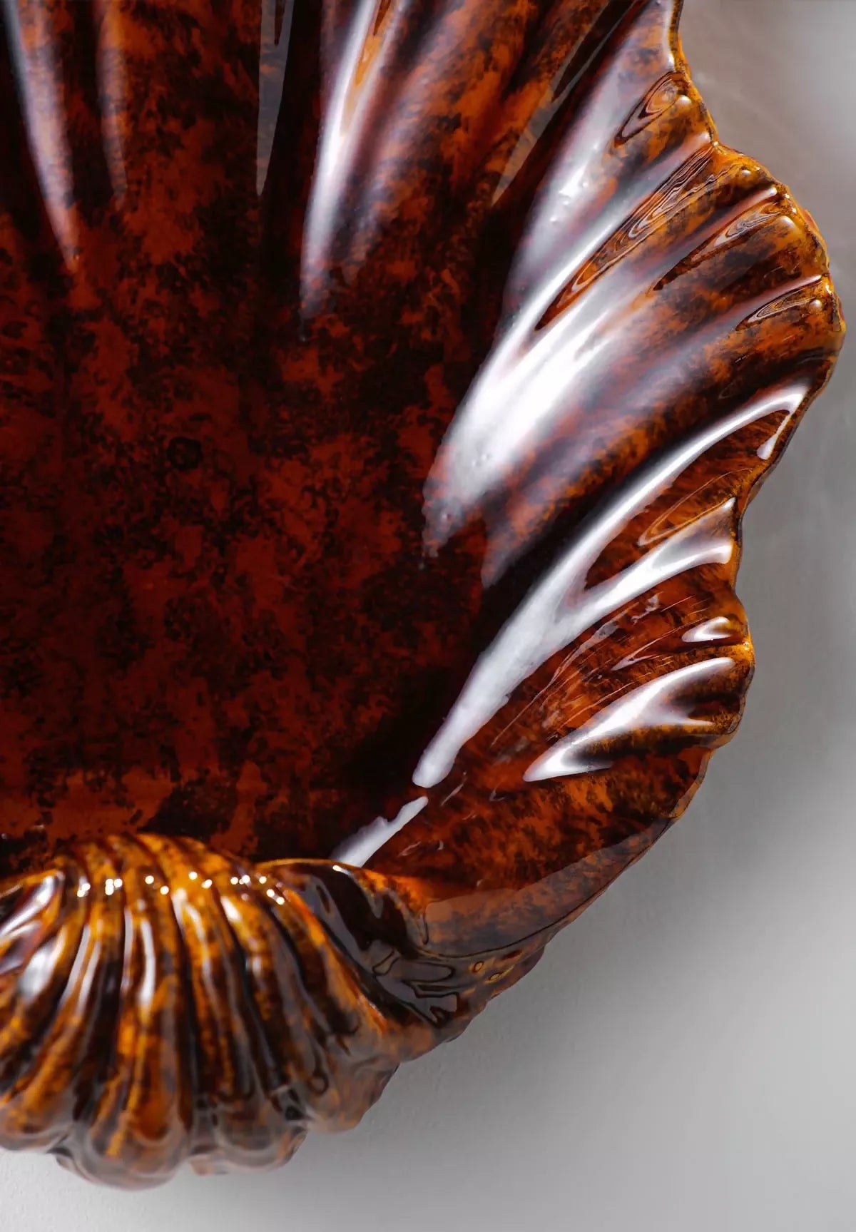 Scalloped tiger's eye Wall light, available  to buy on the-salon.com. SALON curates the finest , unique, handmade pieces from the interior industry's best makers and brands. Shop luxury furniture, lighting, rugs, art, antiques and vintage pieces and accessories from SALON interior designed rooms.