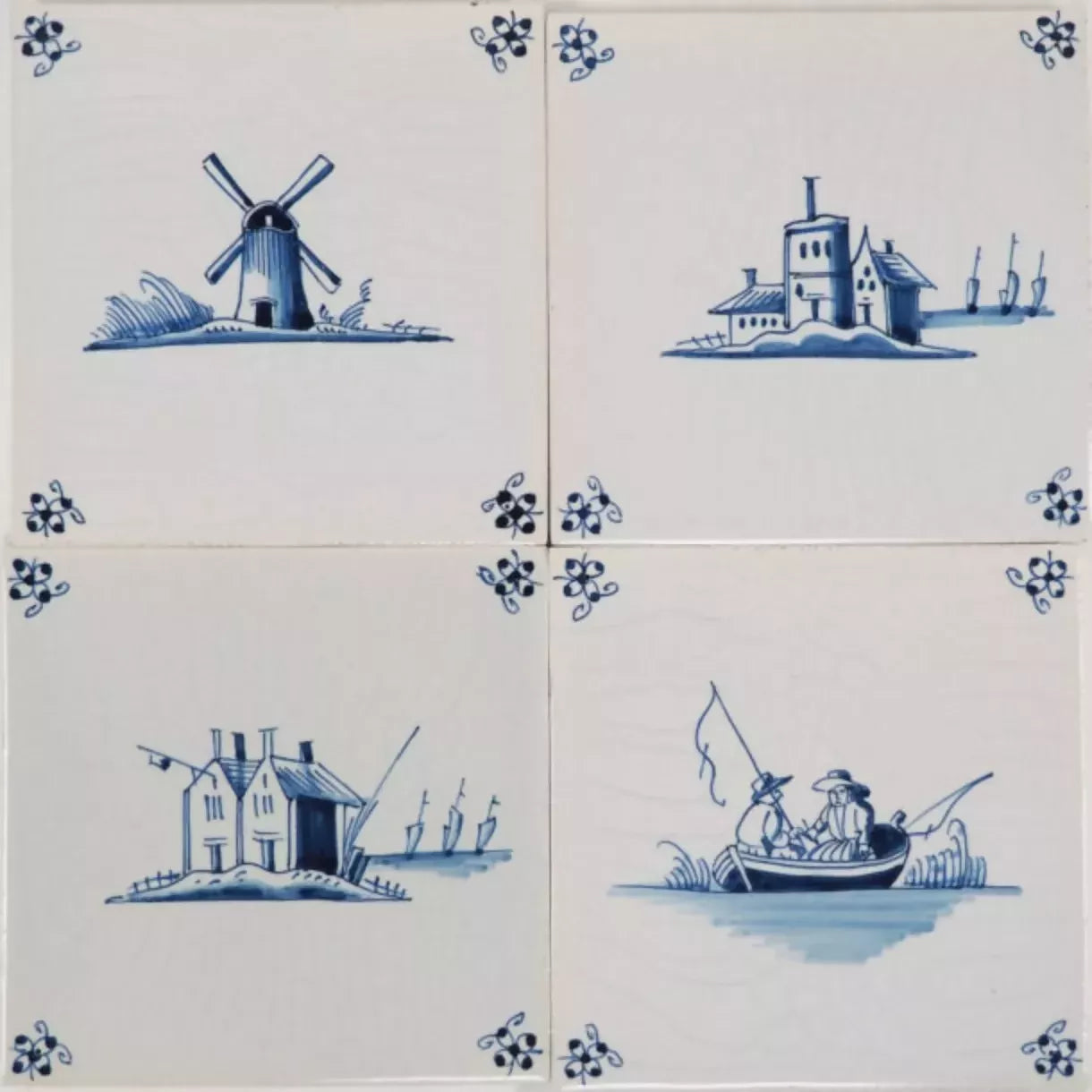 Set of four Delft blue tiles with Dutch scenes including a windmill and people fishing,  available  to buy on the-salon.com. SALON curates the finest , unique, handmade pieces from the interior industry's best makers and brands. Shop luxury furniture, lighting, rugs, art, antiques and vintage pieces and accessories from SALON interior designed rooms.