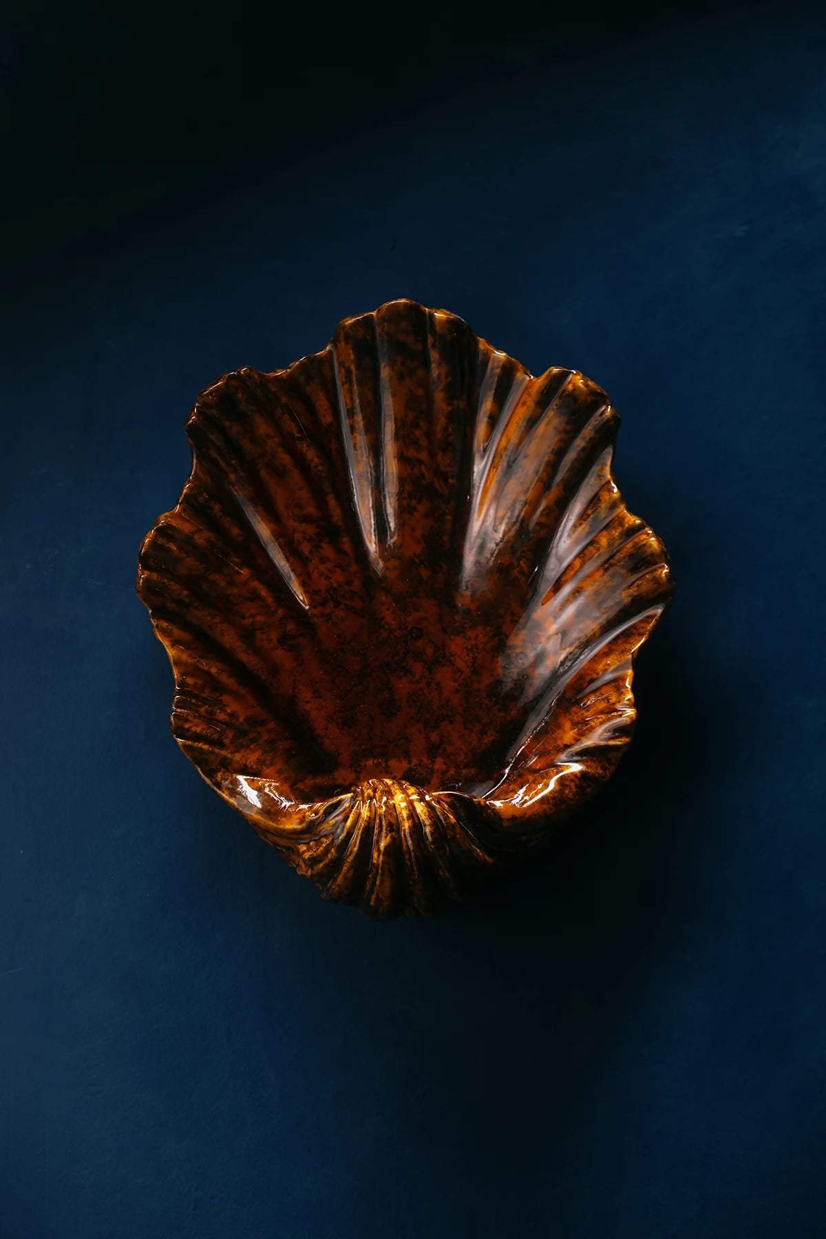 Scalloped tiger's eye Wall light, available  to buy on the-salon.com. SALON curates the finest , unique, handmade pieces from the interior industry's best makers and brands. Shop luxury furniture, lighting, rugs, art, antiques and vintage pieces and accessories from SALON interior designed rooms.