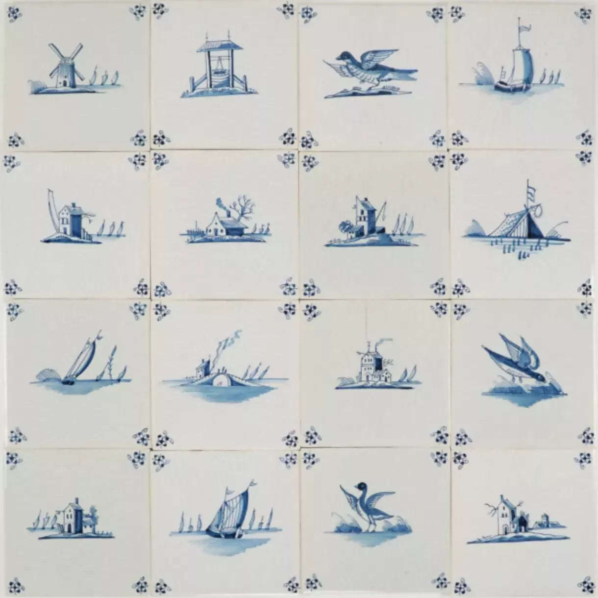 Set of blue and white tiles with various illustrations on a white background,  available  to buy on the-salon.com. SALON curates the finest , unique, handmade pieces from the interior industry's best makers and brands. Shop luxury furniture, lighting, rugs, art, antiques and vintage pieces and accessories from SALON interior designed rooms.