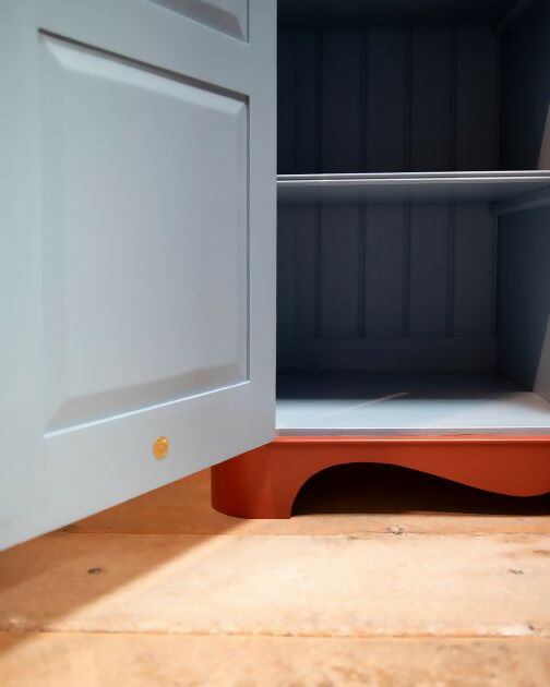Red-curvy-cupboard-Derlanger-Sloan-24040-504x630