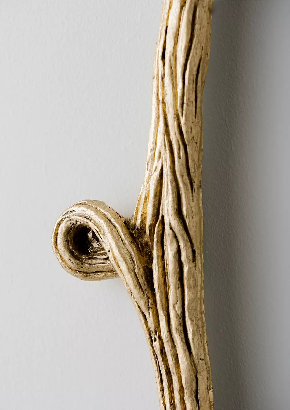 Decorative mirror with a natural wood branch design on a plain background, available  to buy on the-salon.com. SALON curates the finest , unique, handmade pieces from the interior industry's best makers and brands. Shop luxury furniture, lighting, rugs, art, antiques and vintage pieces and accessories from SALON interior designed rooms.
