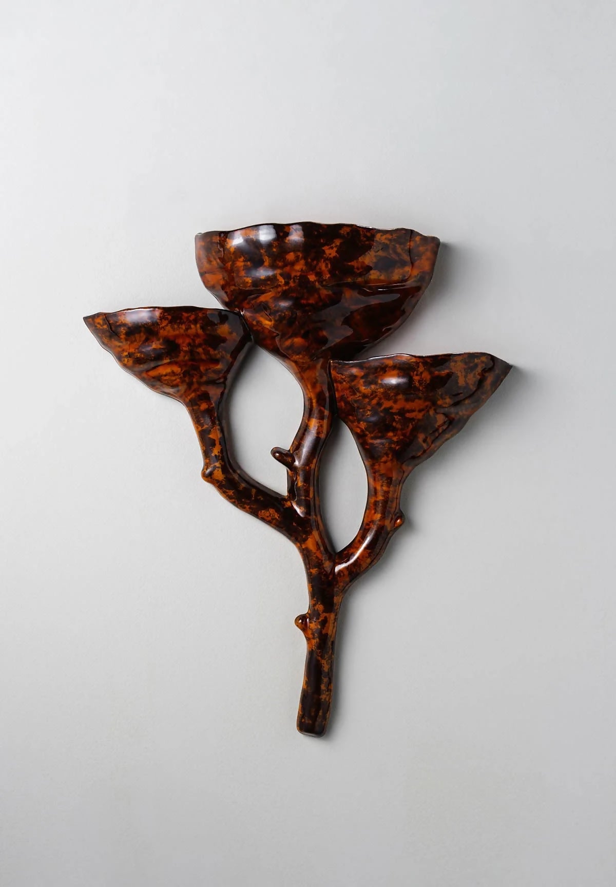 Tiger's eye ceramic wall light- available  to buy on the-salon.com. SALON curates the finest , unique, handmade pieces from the interior industry's best makers and brands. Shop luxury furniture, lighting, rugs, art, antiques and vintage pieces and accessories from SALON interior designed rooms.