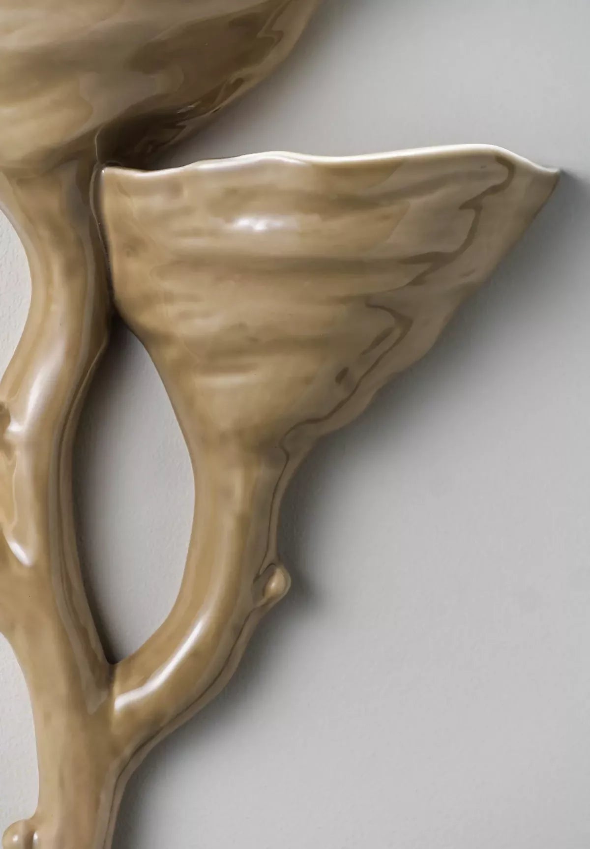 close-up on ceramic almond wall light  available  to buy on the-salon.com. SALON curates the finest , unique, handmade pieces from the interior industry's best makers and brands. Shop luxury furniture, lighting, rugs, art, antiques and vintage pieces and accessories from SALON interior designed rooms.