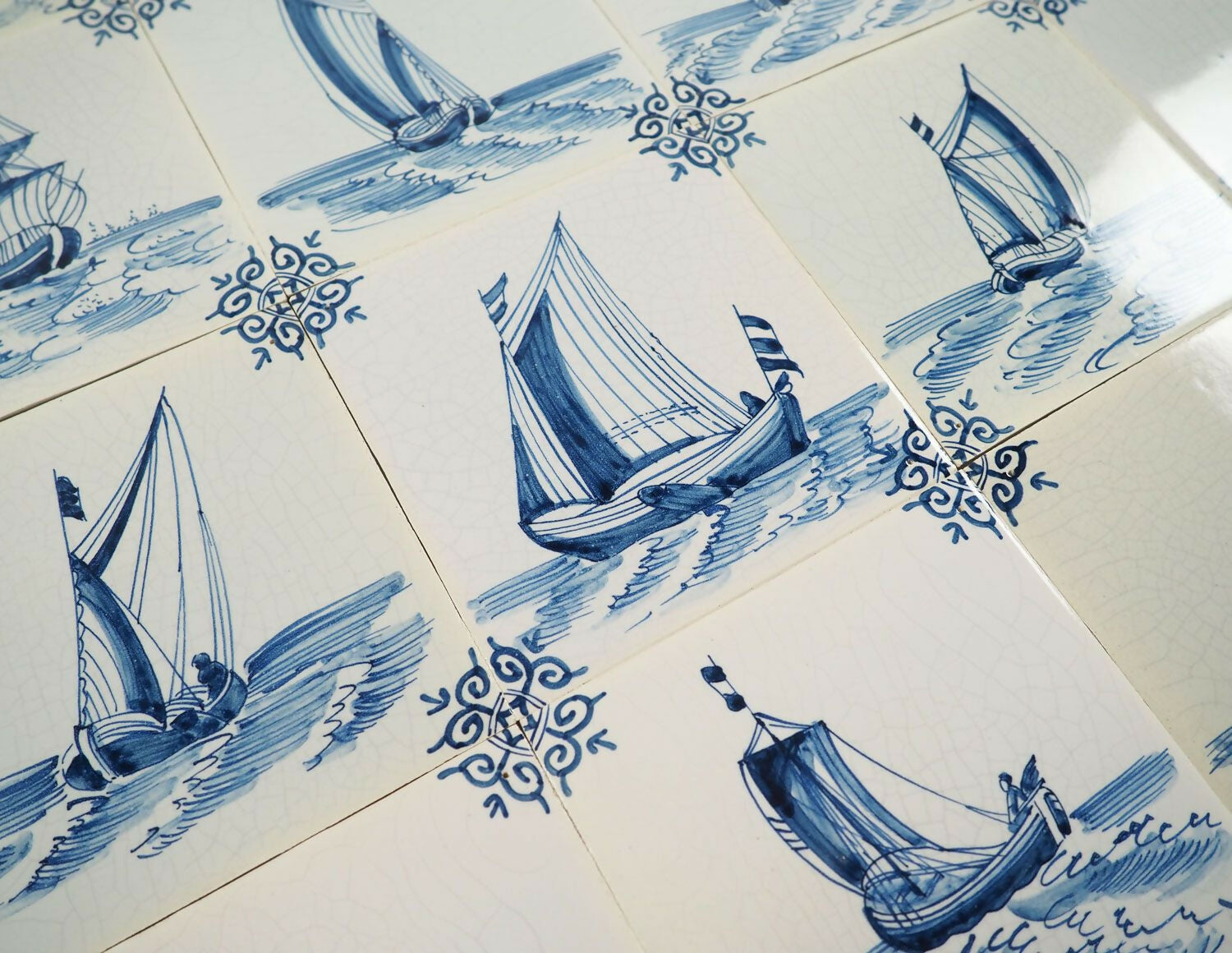 Pattern of blue sailing ships on a white background,available to buy from the-salon.com. SALON curates the finest unique handmade pieces from the interior industry's best makers and brands. Shop luxury furniture, lighting, rugs, art, antiques and vintage pieces and accessories from SALON interior designed rooms. 
