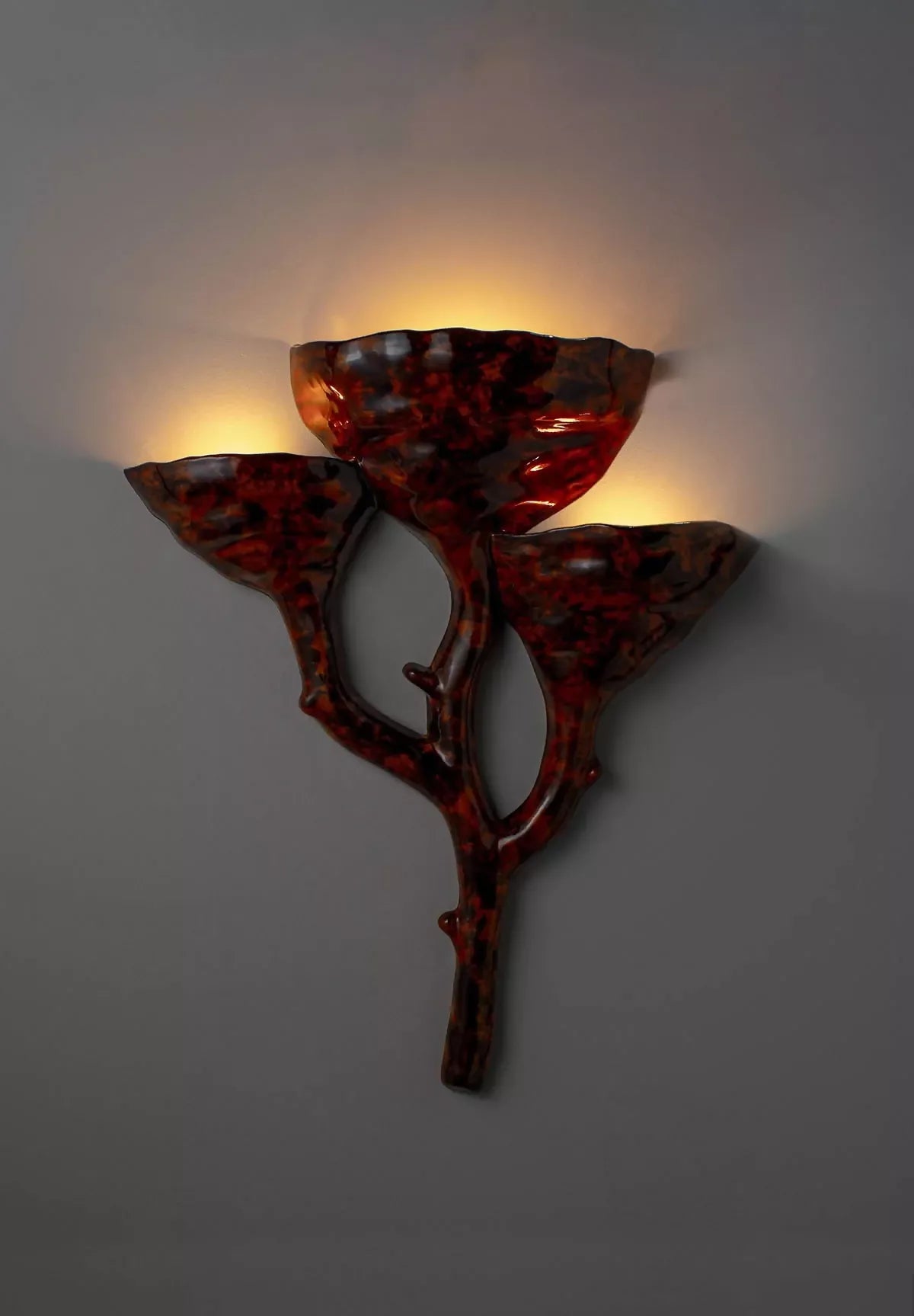 ceramic tiger's eye wall light- available  to buy on the-salon.com. SALON curates the finest , unique, handmade pieces from the interior industry's best makers and brands. Shop luxury furniture, lighting, rugs, art, antiques and vintage pieces and accessories from SALON interior designed rooms.
